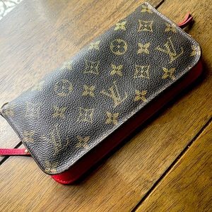 Large monogram authentic Louis Vuitton wallet that holds 12 cards,money&checks..